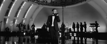 Movie still from “Justin Timberlake - Suit & Tie” (2013), directed by David Fincher – Wide shot, Low angle