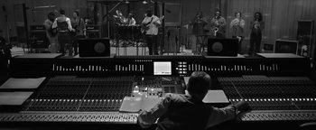 Movie still from “Justin Timberlake - Suit & Tie” (2013), directed by David Fincher – Wide shot, Low angle