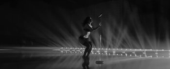 Movie still from “Justin Timberlake - Suit & Tie” (2013), directed by David Fincher – Wide shot, Low angle