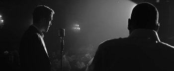 Movie still from “Justin Timberlake - Suit & Tie” (2013), directed by David Fincher – Medium shot, Low angle