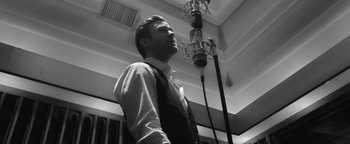 Movie still from “Justin Timberlake - Suit & Tie” (2013), directed by David Fincher – Medium shot, Low angle