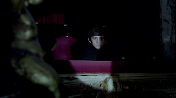 Movie still from “The Killers - Here With Me” (2012), directed by Tim Burton – Medium shot, Low angle