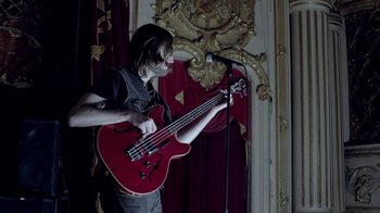 Movie still from “The Killers - Here With Me” (2012), directed by Tim Burton – Medium shot, Low angle