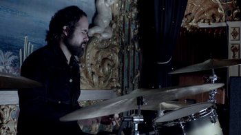 Movie still from “The Killers - Here With Me” (2012), directed by Tim Burton – Medium shot, High angle