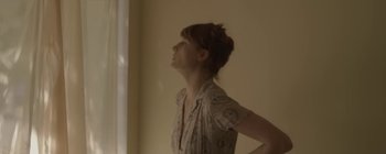 Movie still from “Florence & The Machine - Lover to Lover” (2012), directed by Vincent Haycock – Medium shot, Low angle