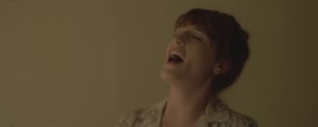 Movie still from “Florence & The Machine - Lover to Lover” (2012), directed by Vincent Haycock – Close Up shot, Low angle