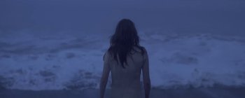 Movie still from “Florence & The Machine - Lover to Lover” (2012), directed by Vincent Haycock – Medium shot, High angle