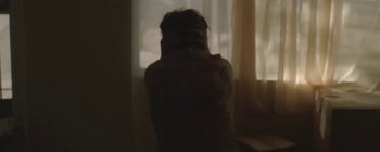 Movie still from “Florence & The Machine - Lover to Lover” (2012), directed by Vincent Haycock – Medium shot, Low angle
