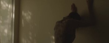 Movie still from “Florence & The Machine - Lover to Lover” (2012), directed by Vincent Haycock – Medium shot, Low angle