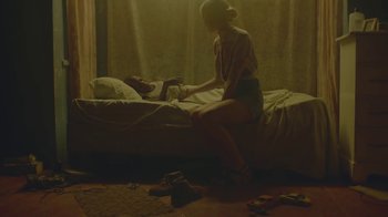 Movie still from “Wild Belle - Keep You” (2012), directed by Melina Matsoukas – Medium shot, High angle