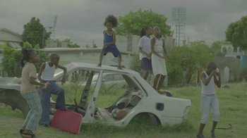 Movie still from “Wild Belle - Keep You” (2012), directed by Melina Matsoukas – Wide shot, Low angle