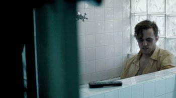 Movie still from “Beach House - Wild” (2012), directed by Johan Renck – Medium shot, High angle