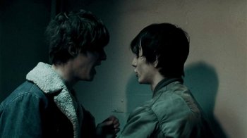 Movie still from “Beach House - Wild” (2012), directed by Johan Renck – Close Up shot, Over the shoulder angle