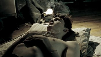 Movie still from “Beach House - Wild” (2012), directed by Johan Renck – Medium shot, Overhead angle