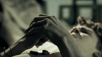 Movie still from “Beach House - Wild” (2012), directed by Johan Renck – Extreme Close Up shot, High angle