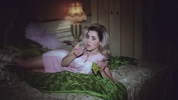 Movie still from “Marina And The Diamonds - Primadonna” (2012), directed by Casper Balslev – Medium shot, High angle