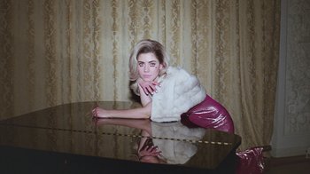 Movie still from “Marina And The Diamonds - Primadonna” (2012), directed by Casper Balslev – Medium shot, High angle