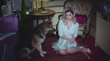 Movie still from “Marina And The Diamonds - Primadonna” (2012), directed by Casper Balslev – Medium shot, High angle