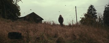 Movie still from “Bon Iver - Towers” (2011), directed by Nabil Elderkin – Wide shot, Low angle