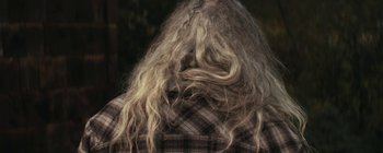 Movie still from “Bon Iver - Towers” (2011), directed by Nabil Elderkin – Close Up shot, Over the shoulder angle