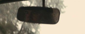 Movie still from “Bon Iver - Towers” (2011), directed by Nabil Elderkin – Extreme Close Up shot, Over the shoulder angle
