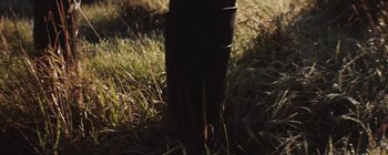 Movie still from “Bon Iver - Towers” (2011), directed by Nabil Elderkin – Medium shot, Low angle