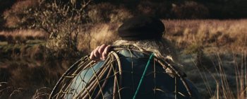 Movie still from “Bon Iver - Towers” (2011), directed by Nabil Elderkin – Medium shot, Low angle