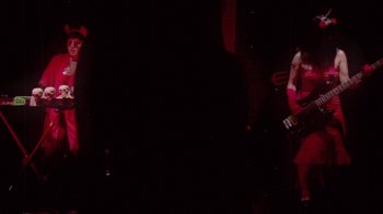 Movie still from “The Suzan - Devils” (2011), directed by Ryan Staake – Medium shot, Low angle