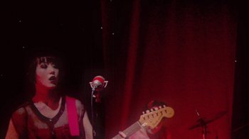 Movie still from “The Suzan - Devils” (2011), directed by Ryan Staake – Extreme Close Up shot, Low angle