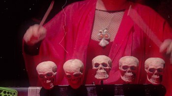 Movie still from “The Suzan - Devils” (2011), directed by Ryan Staake – Extreme Close Up shot, Overhead angle