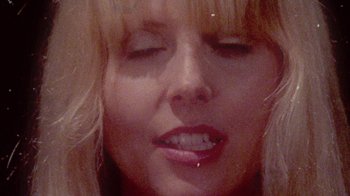 Movie still from “The Suzan - Devils” (2011), directed by Ryan Staake – Extreme Close Up shot, Overhead angle