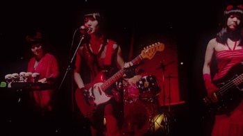 Movie still from “The Suzan - Devils” (2011), directed by Ryan Staake – Medium shot, Low angle