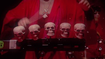 Movie still from “The Suzan - Devils” (2011), directed by Ryan Staake – Extreme Close Up shot, Overhead angle