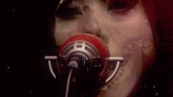 Movie still from “The Suzan - Devils” (2011), directed by Ryan Staake – Extreme Close Up shot, Overhead angle