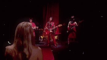 Movie still from “The Suzan - Devils” (2011), directed by Ryan Staake – Medium shot, Over the shoulder angle