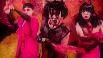 Movie still from “The Suzan - Devils” (2011), directed by Ryan Staake – Medium shot, Low angle