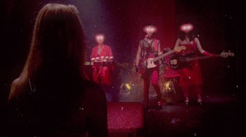 Movie still from “The Suzan - Devils” (2011), directed by Ryan Staake – Extreme Close Up shot, Low angle