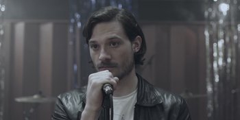 Movie still from “The Floor Is Made Of Lava - Leave Me Now” (2011), directed by Casper Balslev – Close Up shot, High angle