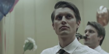 Movie still from “The Floor Is Made Of Lava - Leave Me Now” (2011), directed by Casper Balslev – Close Up shot, Low angle