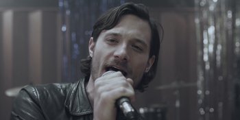 Movie still from “The Floor Is Made Of Lava - Leave Me Now” (2011), directed by Casper Balslev – Close Up shot, Low angle