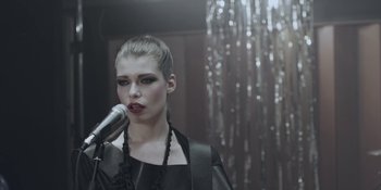 Movie still from “The Floor Is Made Of Lava - Leave Me Now” (2011), directed by Casper Balslev – Close Up shot, Low angle