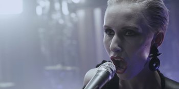 Movie still from “The Floor Is Made Of Lava - Leave Me Now” (2011), directed by Casper Balslev – Close Up shot, Low angle