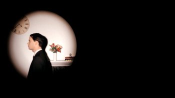 Movie still from “Mirrors - Into The Heart” (2011), directed by Us – Medium shot, Low angle