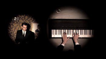 Movie still from “Mirrors - Into The Heart” (2011), directed by Us – Medium shot, Overhead angle