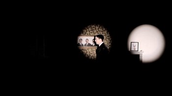 Movie still from “Mirrors - Into The Heart” (2011), directed by Us – Medium shot, Low angle