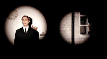 Movie still from “Mirrors - Into The Heart” (2011), directed by Us – Medium shot, Low angle