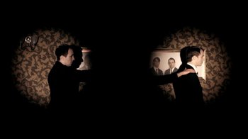 Movie still from “Mirrors - Into The Heart” (2011), directed by Us – Medium shot, Over the shoulder angle