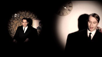 Movie still from “Mirrors - Into The Heart” (2011), directed by Us – Medium shot, Low angle