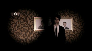 Movie still from “Mirrors - Into The Heart” (2011), directed by Us – Medium shot, Low angle