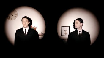 Movie still from “Mirrors - Into The Heart” (2011), directed by Us – Medium shot, Low angle